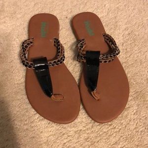 Brown & black flip flops